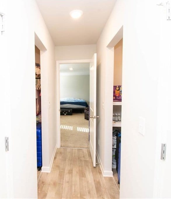 hall featuring light hardwood / wood-style floors