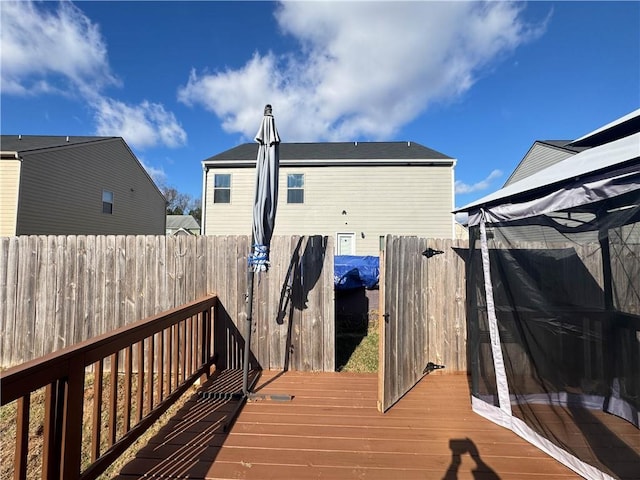 rear view of property with a deck