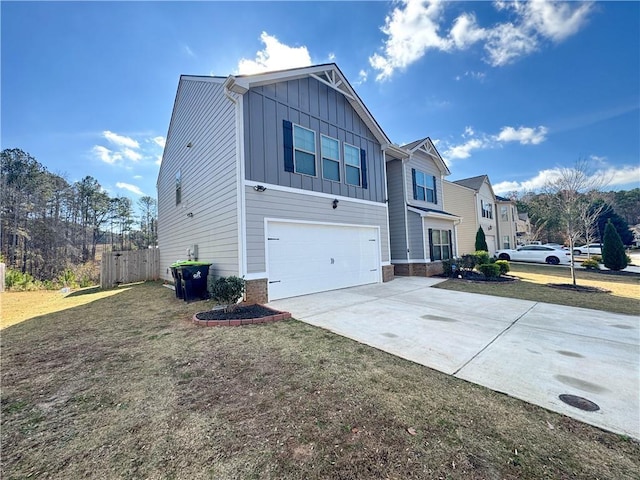 view of home's exterior featuring a yard and a garage