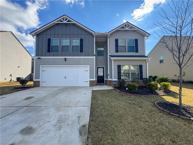 view of front of home with central AC unit, a garage, and a front yard