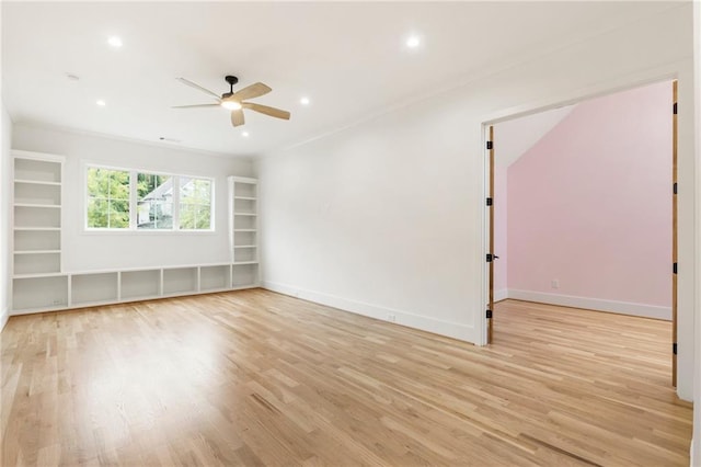 unfurnished room featuring ceiling fan and light hardwood / wood-style floors