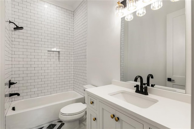 full bathroom with vanity, toilet, and tiled shower / bath