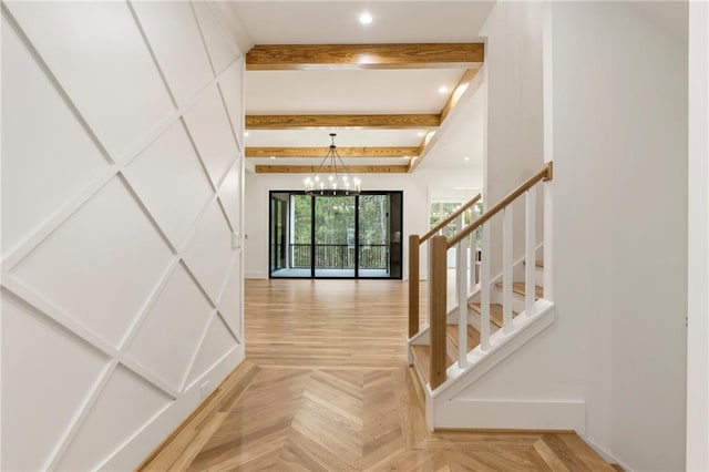 foyer with beam ceiling, parquet flooring, and an inviting chandelier