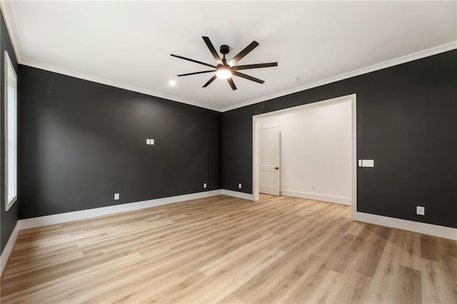 unfurnished room with ceiling fan, crown molding, and light hardwood / wood-style flooring