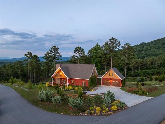 view of front of property with a mountain view