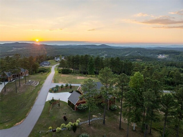 aerial view at dusk with a mountain view