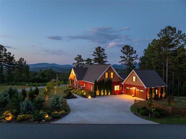 view of front of home featuring a mountain view