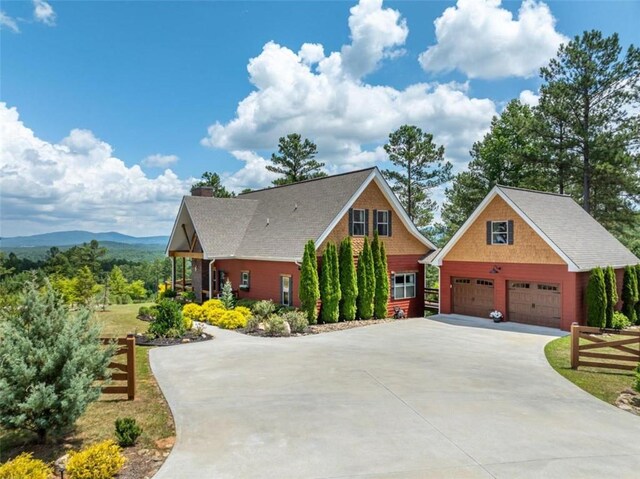 view of front of house featuring a mountain view and a garage