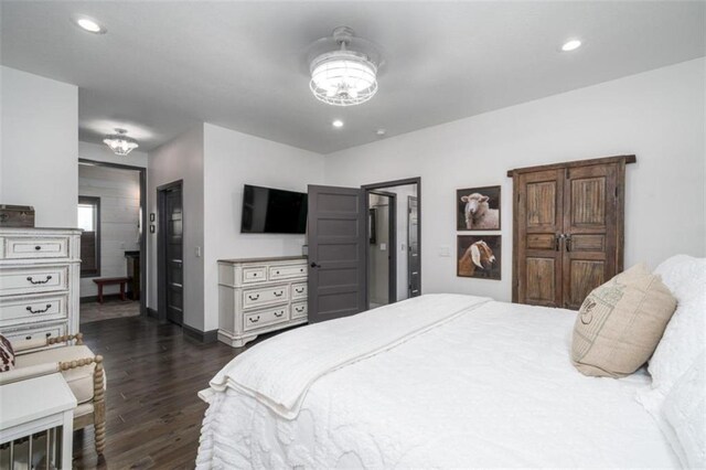 bedroom featuring dark hardwood / wood-style floors