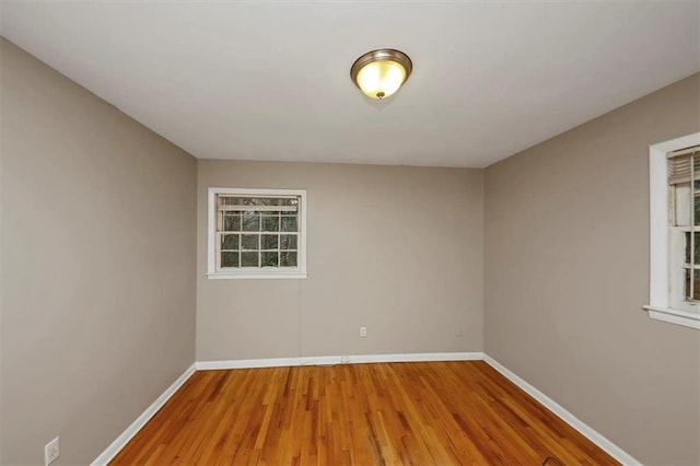 spare room featuring hardwood / wood-style floors