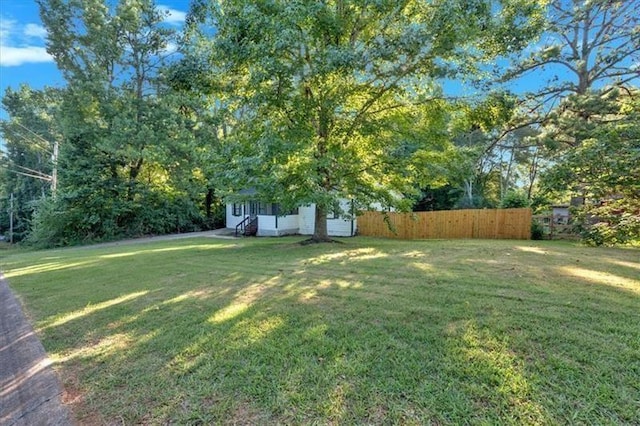 view of yard with fence