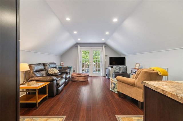 living room featuring lofted ceiling and dark hardwood / wood-style floors