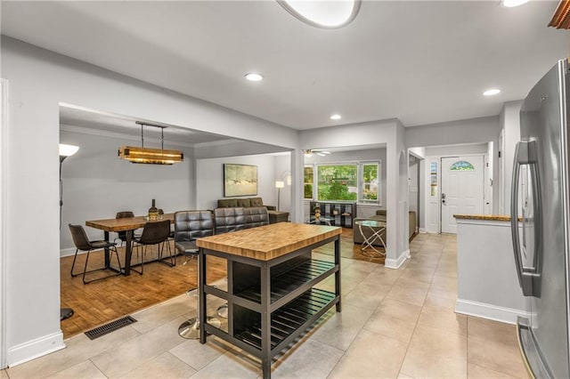 3307 Pointe Bleue Ct, Decatur, GA 30034 - kitchen featuring freestanding refrigerator, baseboards, light tile patterned floors, recessed lighting, and pendant lighting