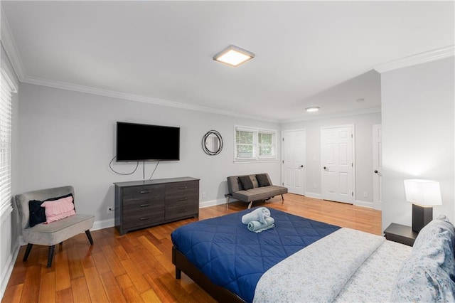 3307 Pointe Bleue Ct, Decatur, GA 30034 - bedroom featuring ornamental molding, wood finished floors, and baseboards