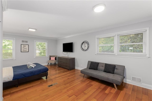 3307 Pointe Bleue Ct, Decatur, GA 30034 - bedroom with light wood-style flooring, ornamental molding, and baseboards