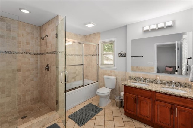 3307 Pointe Bleue Ct, Decatur, GA 30034 - full bathroom featuring toilet, tile walls, double vanity, and tile patterned flooring
