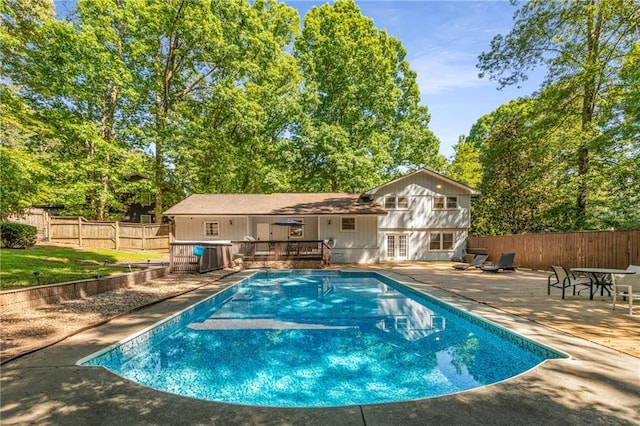 3307 Pointe Bleue Ct, Decatur, GA 30034 - view of pool with french doors, a patio area, a fenced backyard, cooling unit, and view of scattered trees