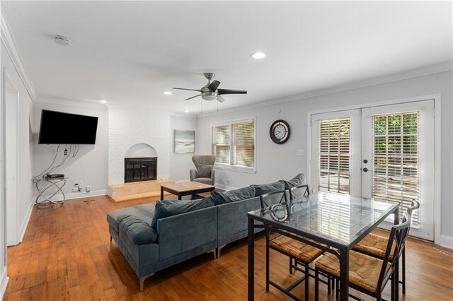3307 Pointe Bleue Ct, Decatur, GA 30034 - living room featuring crown molding, a large fireplace, a ceiling fan, french doors, and baseboards