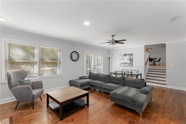 3307 Pointe Bleue Ct, Decatur, GA 30034 - living room with crown molding, stairway, baseboards, a ceiling fan, and wood finished floors