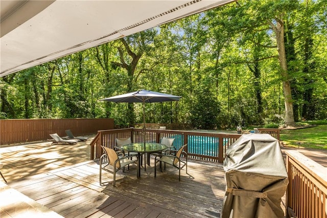 3307 Pointe Bleue Ct, Decatur, GA 30034 - wooden deck with outdoor dining area, fence, and a swimming pool