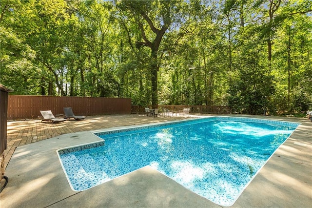 3307 Pointe Bleue Ct, Decatur, GA 30034 - view of swimming pool with fence, a wooden deck, and a patio area