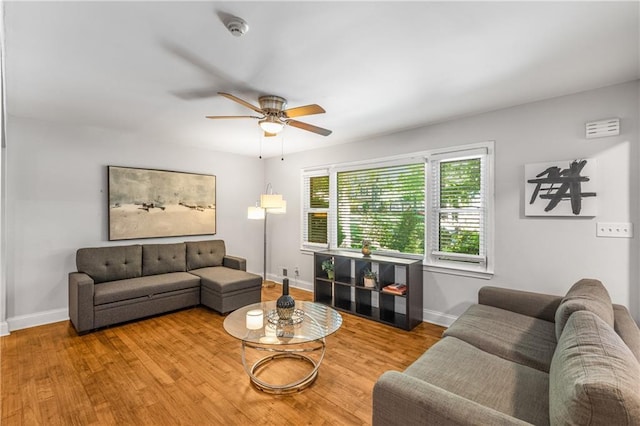 3307 Pointe Bleue Ct, Decatur, GA 30034 - living area with a ceiling fan, wood finished floors, and baseboards