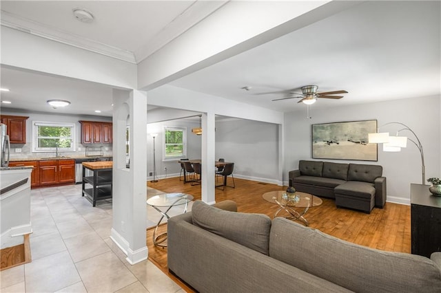 3307 Pointe Bleue Ct, Decatur, GA 30034 - living room with a ceiling fan, crown molding, baseboards, and light tile patterned floors