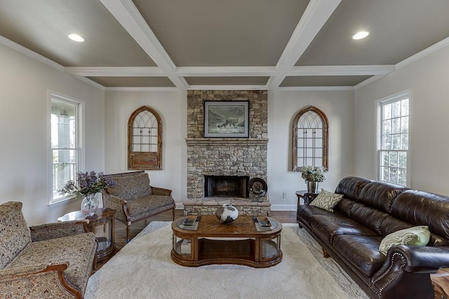 living room featuring beamed ceiling, wood-type flooring, coffered ceiling, and a fireplace