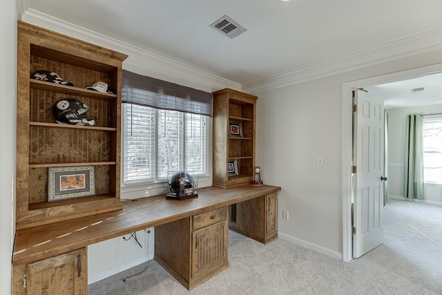 carpeted home office featuring ornamental molding