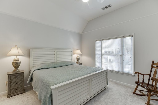 carpeted bedroom featuring lofted ceiling and ceiling fan