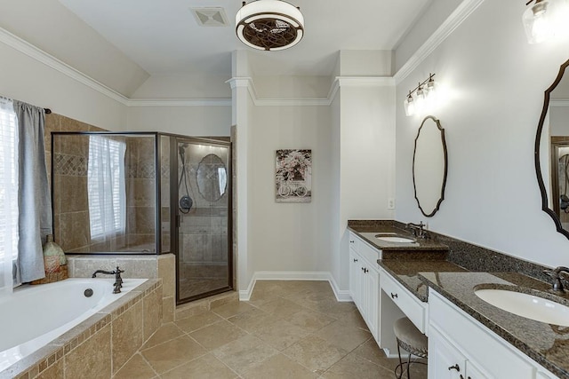 bathroom with vanity, ornamental molding, and shower with separate bathtub