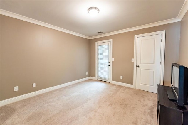 unfurnished living room with light colored carpet and ornamental molding