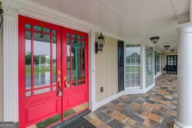 entrance to property featuring gas water heater
