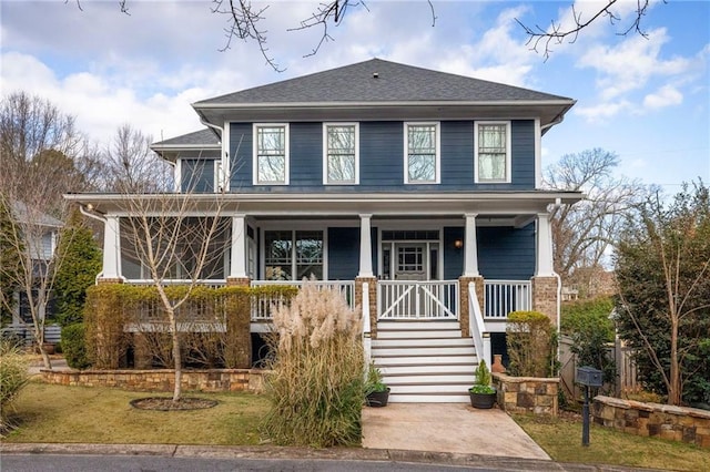 1602 Windsor Walk, Avondale Estates, GA 30002 - traditional style home with covered porch, a front yard, and roof with shingles
