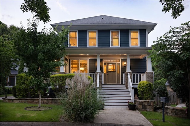 1602 Windsor Walk, Avondale Estates, GA 30002 - american foursquare style home featuring a porch and a front yard