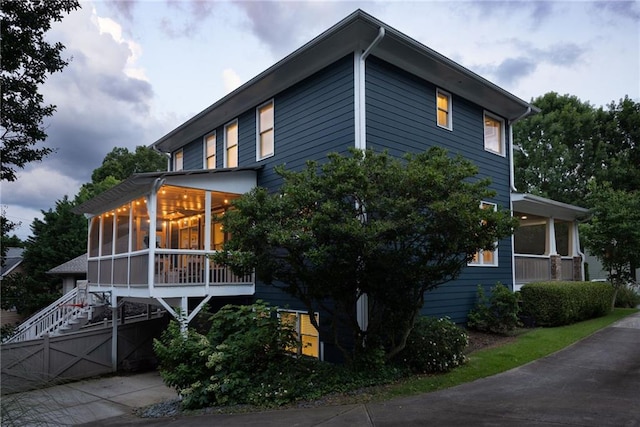 1602 Windsor Walk, Avondale Estates, GA 30002 - view of side of home with a sunroom