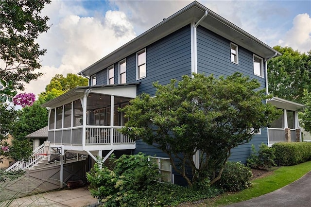 1602 Windsor Walk, Avondale Estates, GA 30002 - view of home's exterior with a sunroom