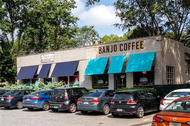 1602 Windsor Walk, Avondale Estates, GA 30002 - view of building exterior featuring uncovered parking