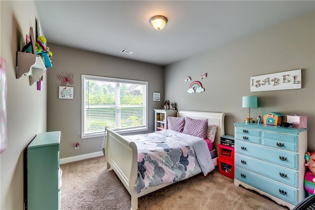 1412 Chapman Cir, Monroe, GA 30656 - bedroom featuring light carpet and baseboards