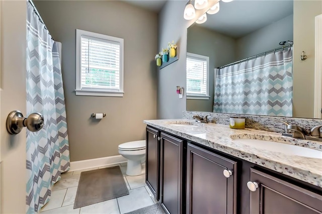 1412 Chapman Cir, Monroe, GA 30656 - full bathroom with healthy amount of natural light, double vanity, tile patterned flooring, and a shower with shower curtain