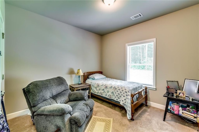 1412 Chapman Cir, Monroe, GA 30656 - carpeted bedroom featuring baseboards