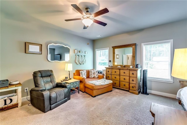 1412 Chapman Cir, Monroe, GA 30656 - sitting room featuring carpet flooring, ceiling fan, and healthy amount of natural light
