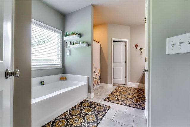 1412 Chapman Cir, Monroe, GA 30656 - bathroom with a bath, tile patterned flooring, and a shower with curtain