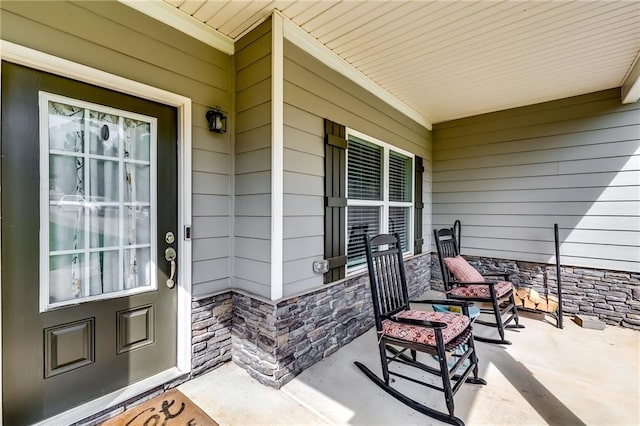 1412 Chapman Cir, Monroe, GA 30656 - entrance to property with a porch and stone siding