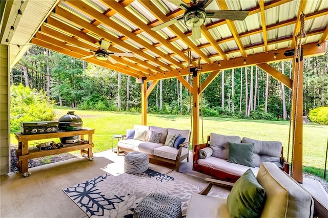 1412 Chapman Cir, Monroe, GA 30656 - view of patio / terrace featuring ceiling fan, an outdoor hangout area, and view of scattered trees