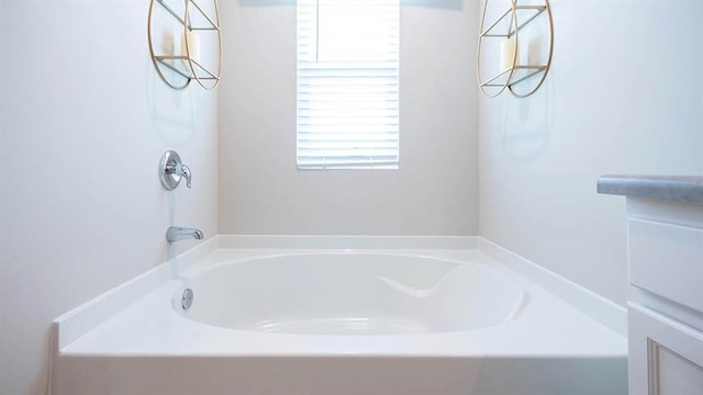 bathroom featuring a bath