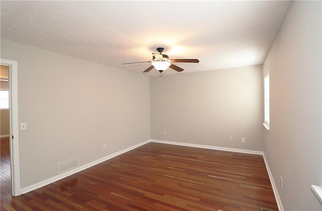 5415 Keithwood Dr, Cumming, GA 30040 - unfurnished room featuring visible vents, baseboards, a ceiling fan, and wood finished floors