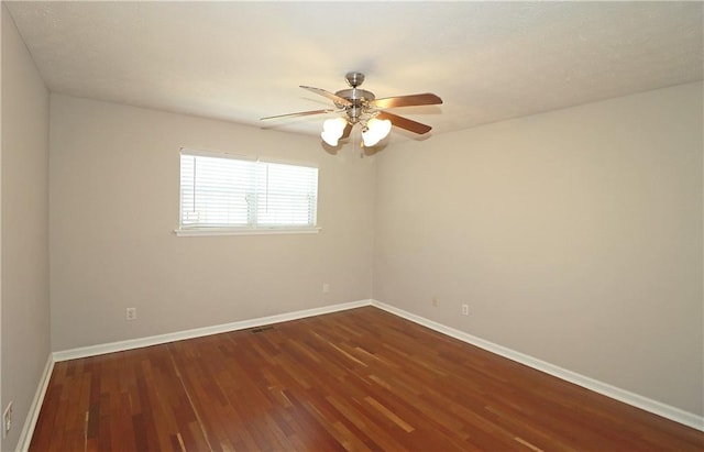 5415 Keithwood Dr, Cumming, GA 30040 - spare room featuring ceiling fan, baseboards, and wood finished floors
