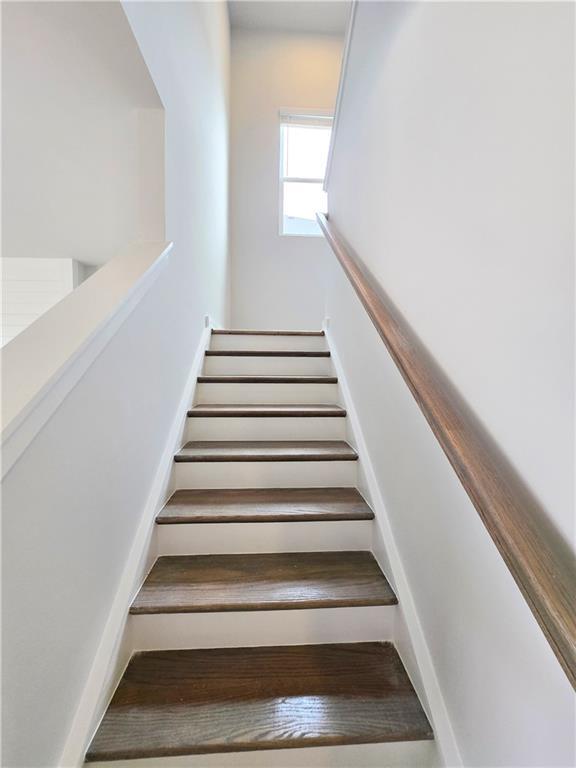 spare room featuring recessed lighting, carpet flooring, visible vents, and baseboards