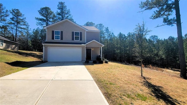 traditional-style home with a garage, concrete driveway, and a front yard